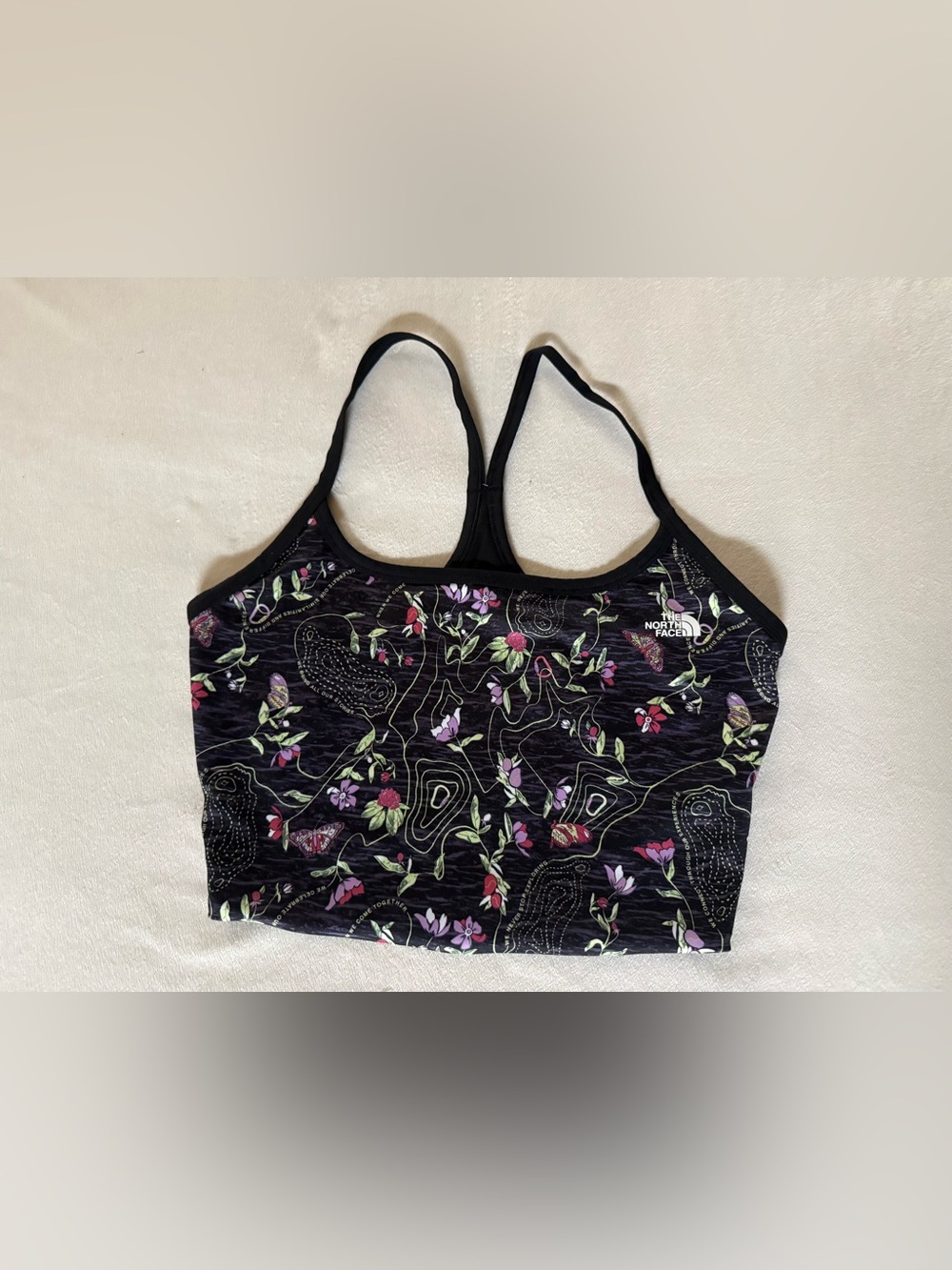 The North Face Black Floral Racerback Sports Bra with Pink & Green Accents